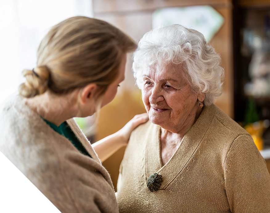 elderly-woman-and-nurse-smiling-together