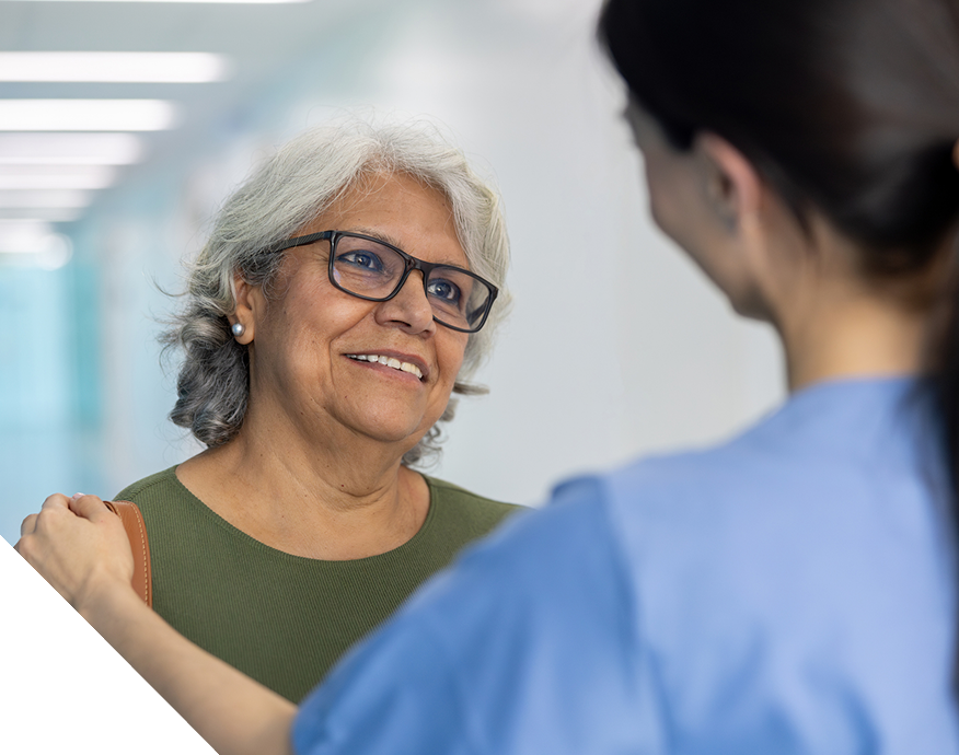 elderly-woman-and-nurse-talking