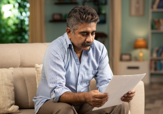 man-reading-grief-resources
