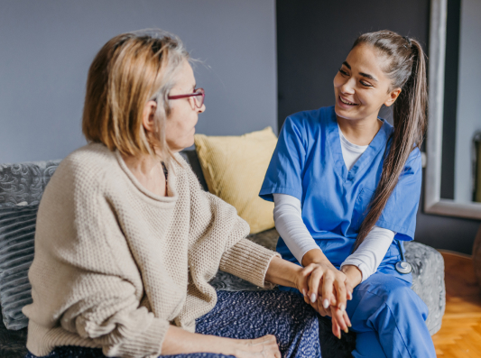 nurse-talking-with-caregiver-adult-daughter